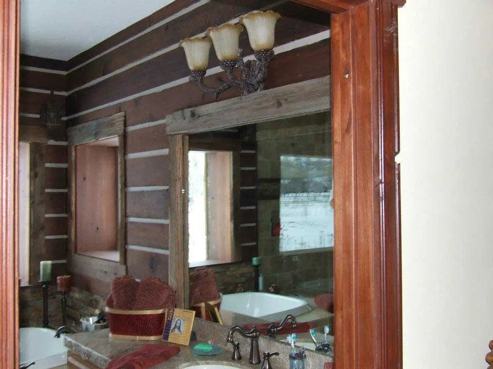 image shows a bathroom interior featuring a rustic design
